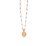 Medalla ovalada para Bautizo con imagen en relieve del Espíritu Santo adornada con zirconias en corte brillante.  Oro Combinado Amarillo, Blanco y Rosa de 10 kilates.