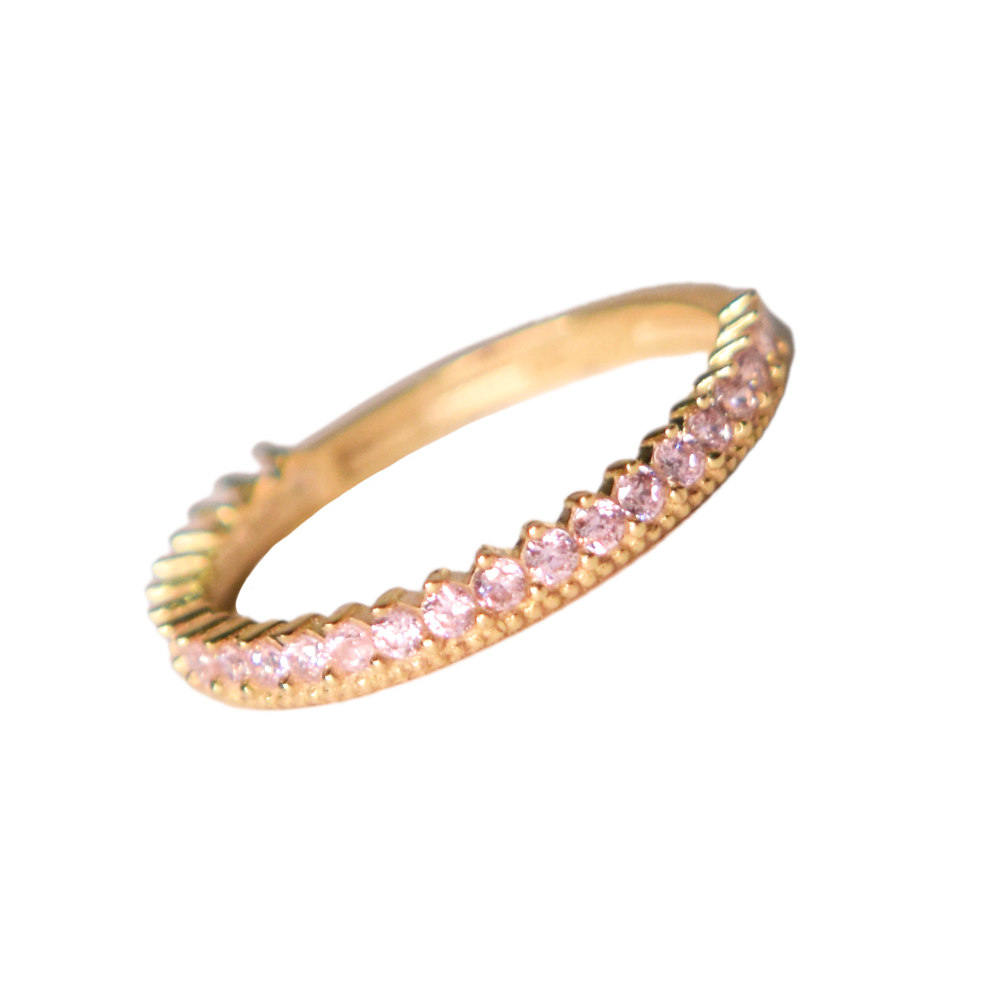Churumbela con zirconia; en oro color amarillo y zirconias en color rosa con vista al frente de perfil completo