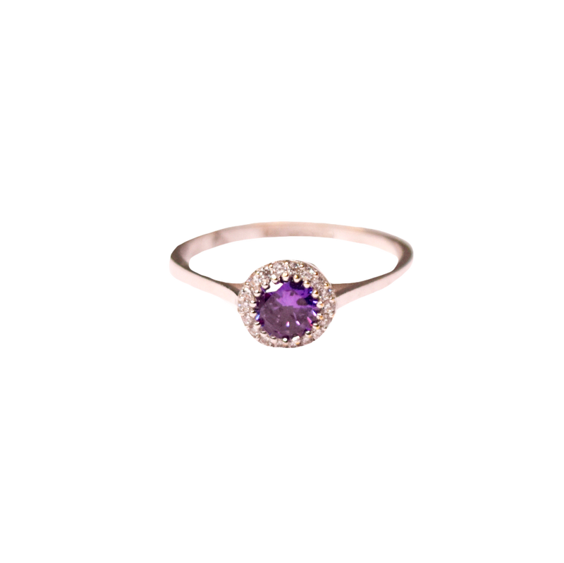 Anillo para Dama con piedra Morada Central y halo de Zirconias en Corte Brillante.  Oro Blanco de 14 kilates.