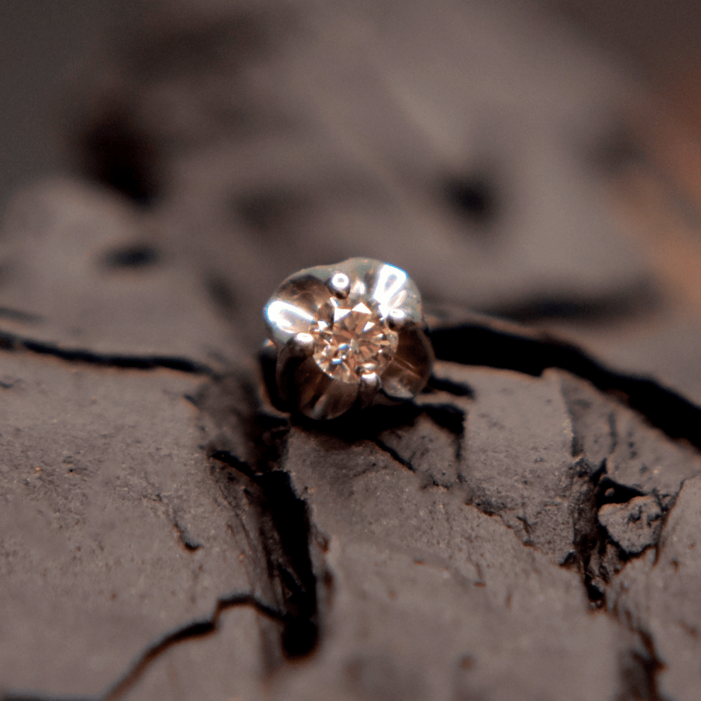 Broquel Flor Oro 14k con Diamante