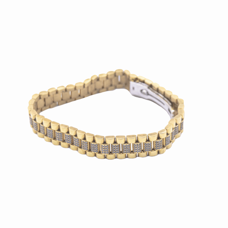 Pulso para Caballero. Tejido tipo "Rolex" con zirconias en corte brillante.  22cm de largo.  Oro Amarillo de 10 kilates.