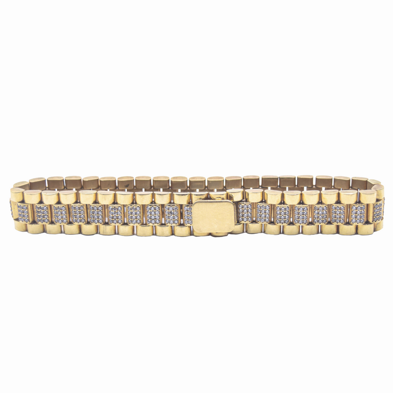 Pulso para Caballero. Tejido tipo "Rolex" con zirconias en corte brillante.  22cm de largo.  Oro Amarillo de 10 kilates.